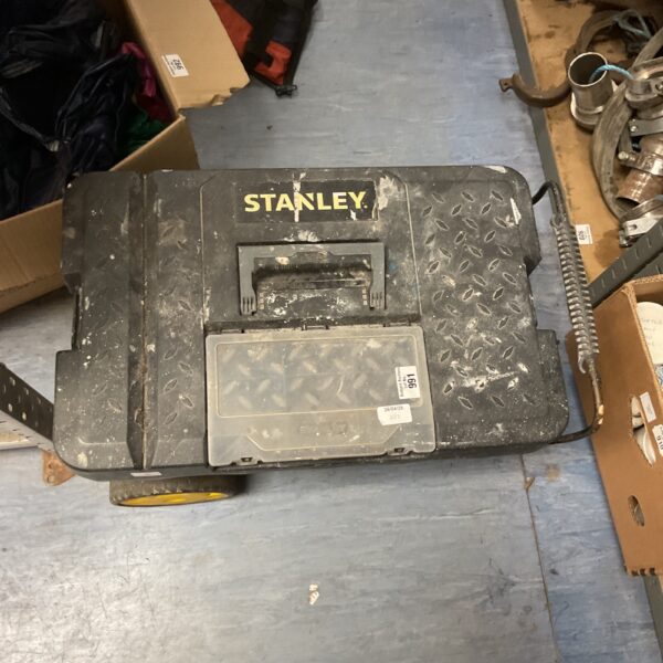 Large Stanley rolling toolbox for tool storage and transport.