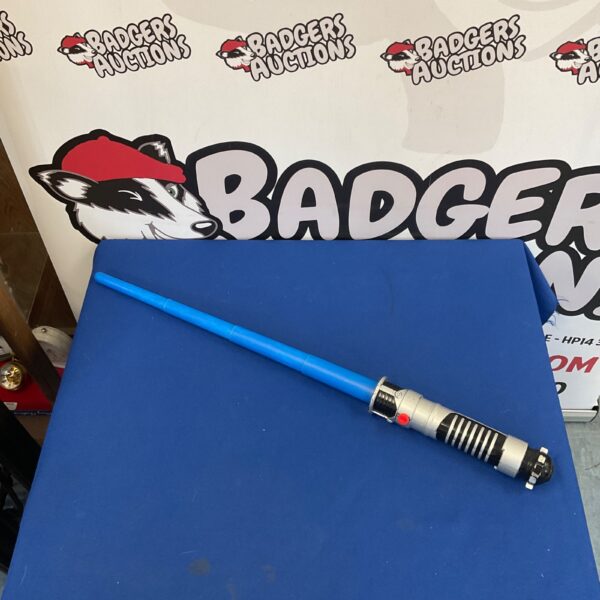 Vintage blue Star Wars lightsaber toy for collectors.