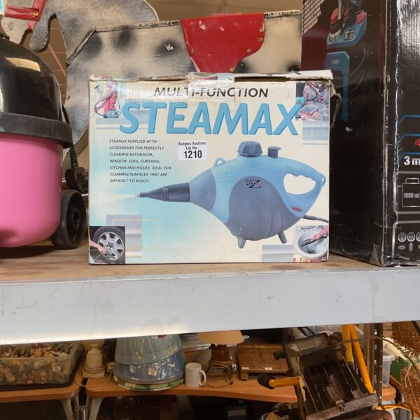 Steammax handheld steam cleaner model 1210 with attachments.