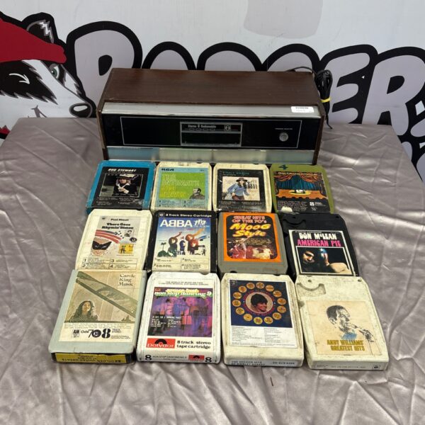 Vintage Stereo 8 Radiomobile 8 track player with selection of tapes.