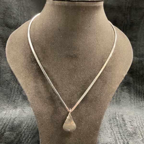 Hallmarked sterling silver choker necklace, elegant minimalist design.