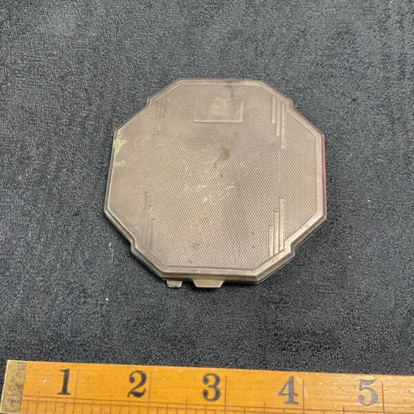 Vintage sterling silver powder compact with engine turning.