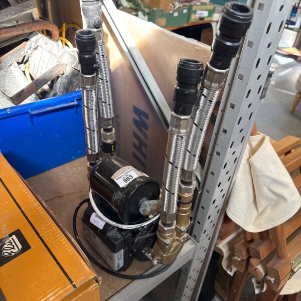 Front view of Stuart Turner Monsoon twin shower pump.