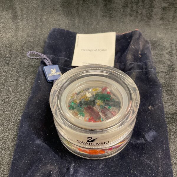 Vintage Swarovski crystal set with colourful animal figurines.