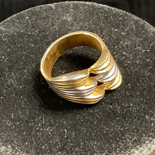Silver and gold swirl pattern ring, size S.