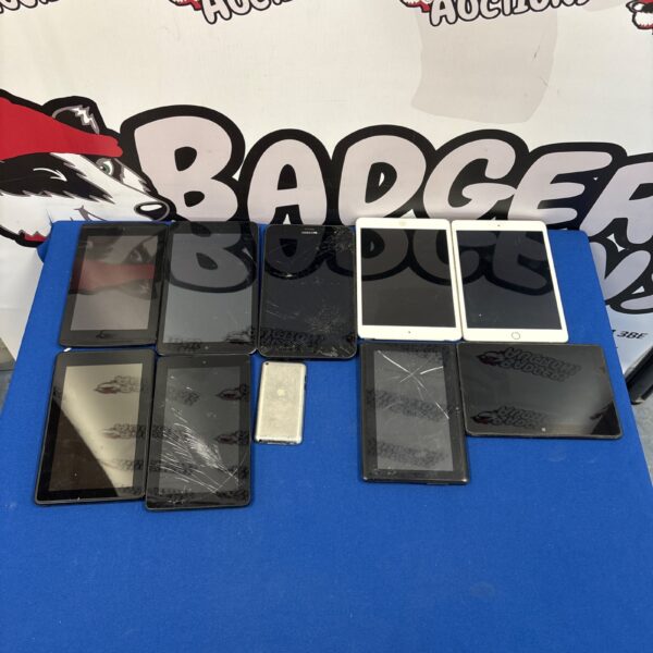 Assortment of used tablets in a lot for sale.