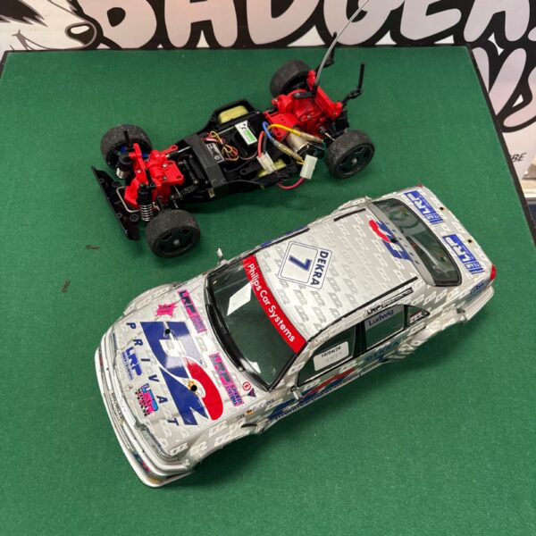 Tamiya Mercedes AMG RC car body with Dekra livery, vintage touring car.