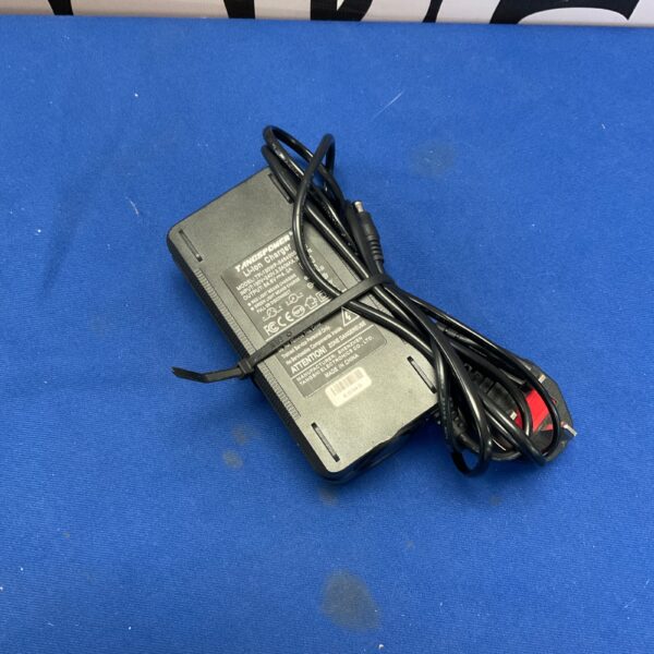 Black TangsPower 54.6V Li-ion charger with power cord.