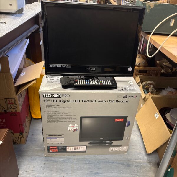 Boxed Technika Pro 19 inch LCD TV with DVD player and USB recording.