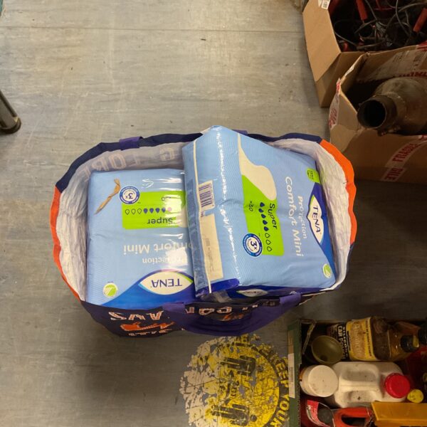 Sealed bag of Tena Comfort Mini incontinence pads for discreet protection.