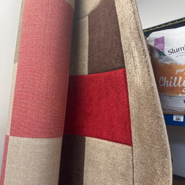 Large thinkrugs MT04 rug in beige and red patterned design.