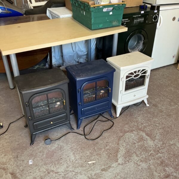 Lot of three vintage stove heaters for sale.