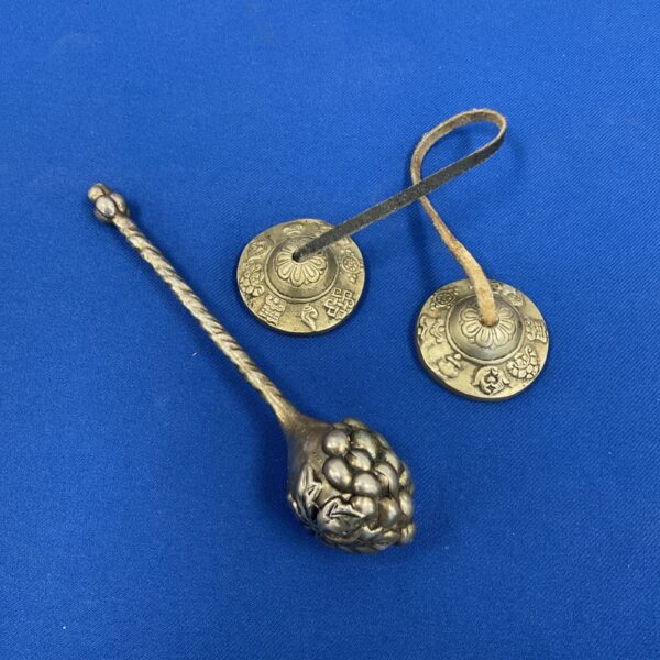 Antique Tibetan cymbals and silver plated bottle stopper set.