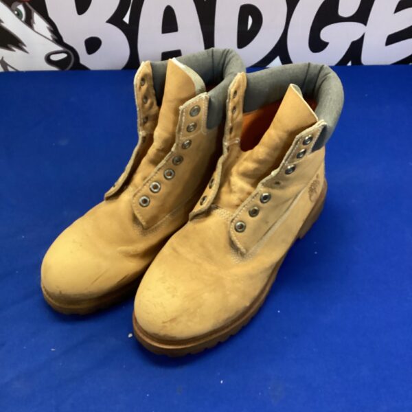 Size 10 Timberland steel toe boots, durable leather work footwear.