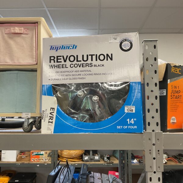 Toptech Revolution wheel covers displayed in packaging.