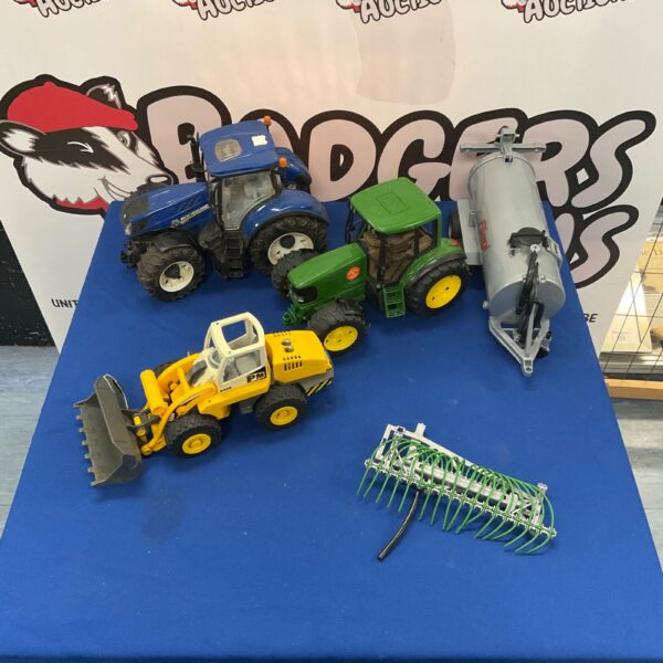 Toy farm vehicle lot including New Holland tractor and Playmobil digger.