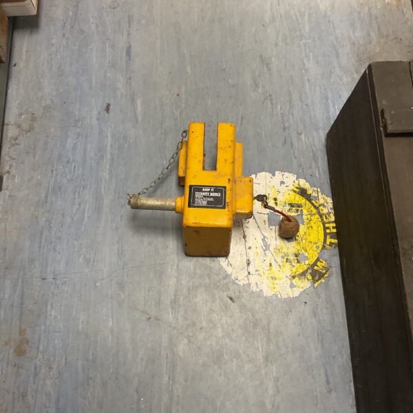Yellow heavy-duty trailer security lock for wheel immobilisation.