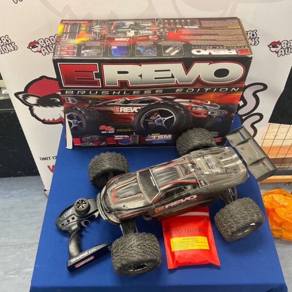 Traxxas E Revo Brushless RC car in used condition, ready for auction.