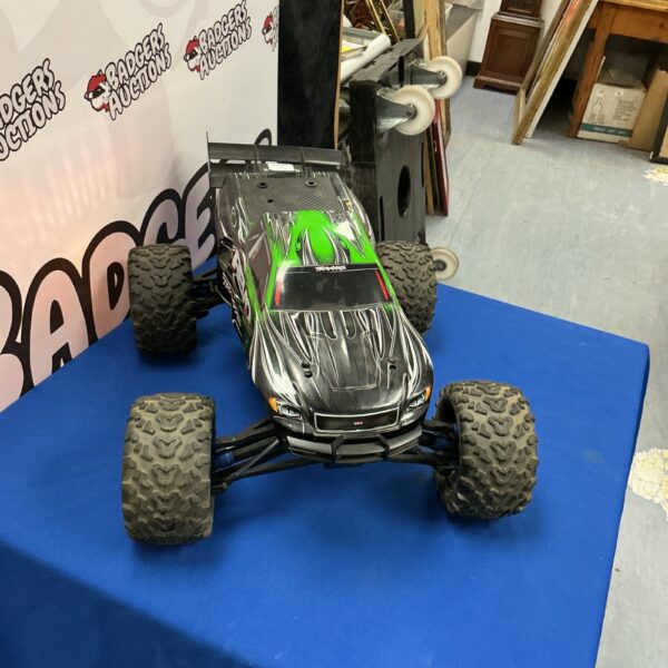 Blue table featuring a Traxxas Revo RC car.