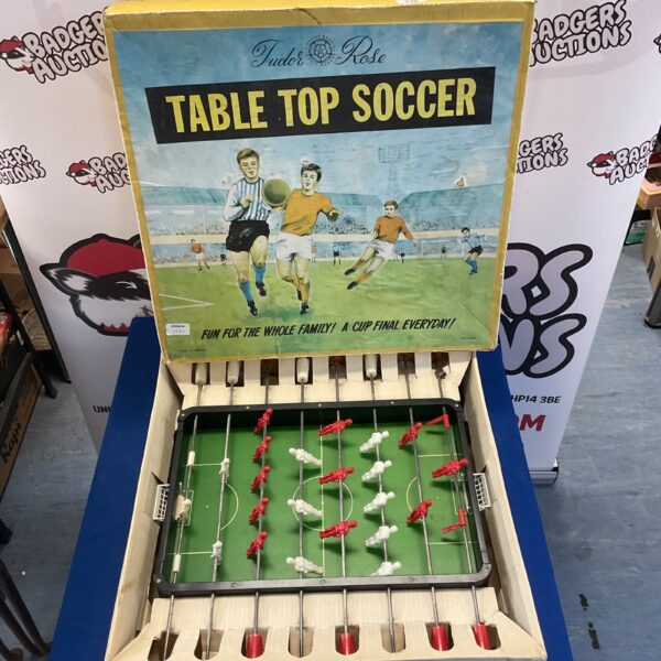 Vintage Tudor Rose table soccer game with plastic players.