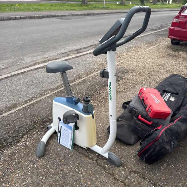 Front view of a used Tunturi exercise bike for home fitness.