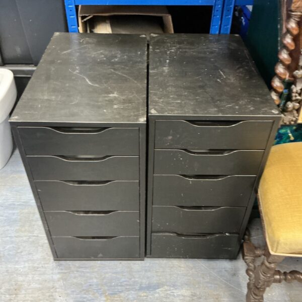 Two metal filing cabinets for office document storage.