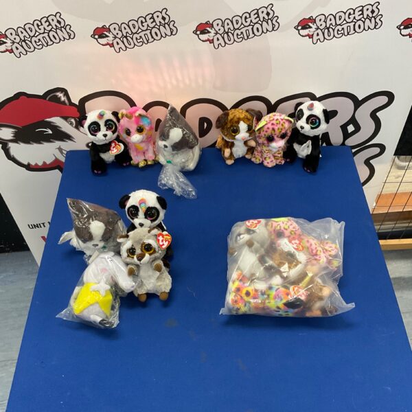Lot of new TY Beanie Babies plush toys for collectors.