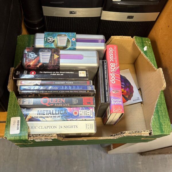Mixed VHS and DVD lot for collectors and film enthusiasts.