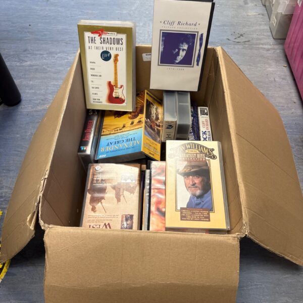 Mixed lot of vintage VHS tapes for collectors.