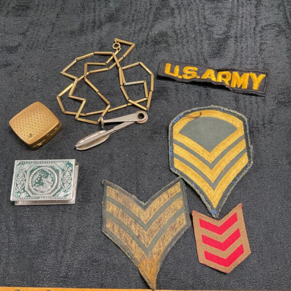 Vietnam War US Army patches and vintage smoking accessories collection.