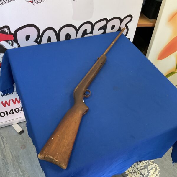 Side view of a vintage air rifle for restoration.