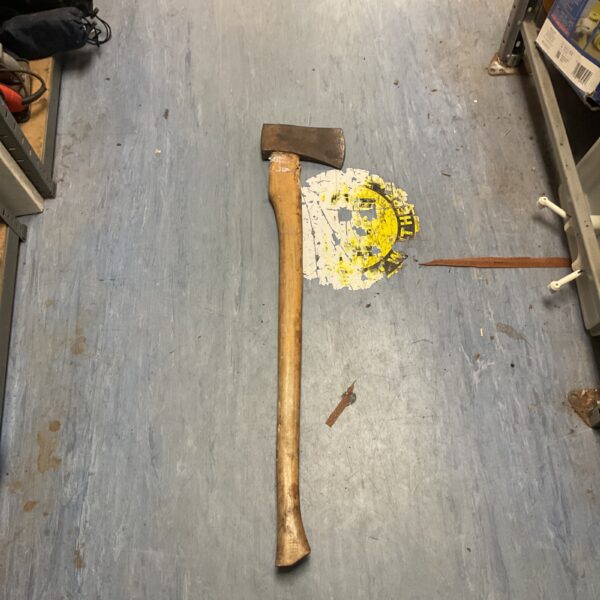 Vintage axe with a wooden handle, ideal for collecting or display.