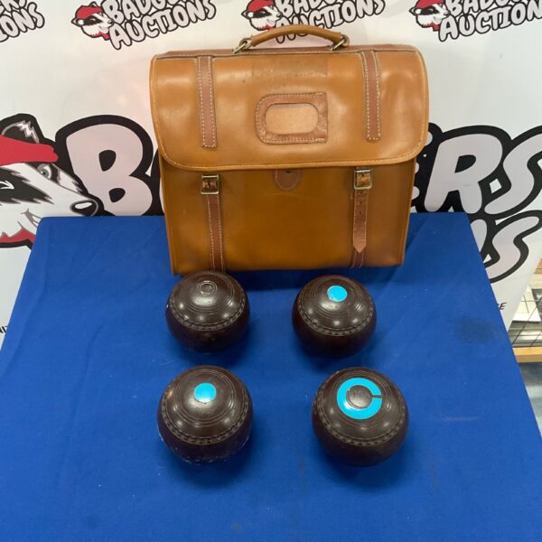 Vintage Bakelite bowls set for lawn bowls, a classic retro game.