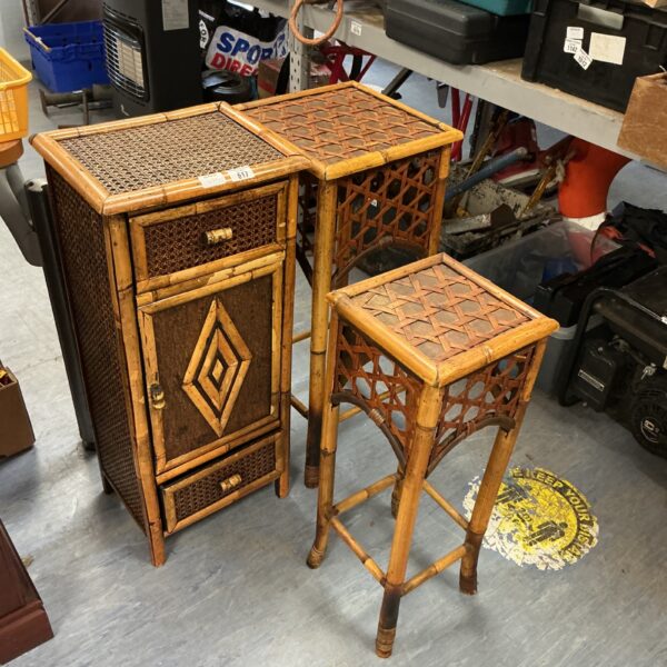 Vintage bamboo jardiniere stands with woven raffia detail.