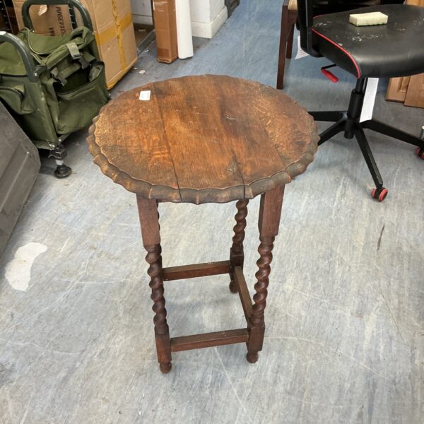 Vintage oak barley twist table with pie crust edge.