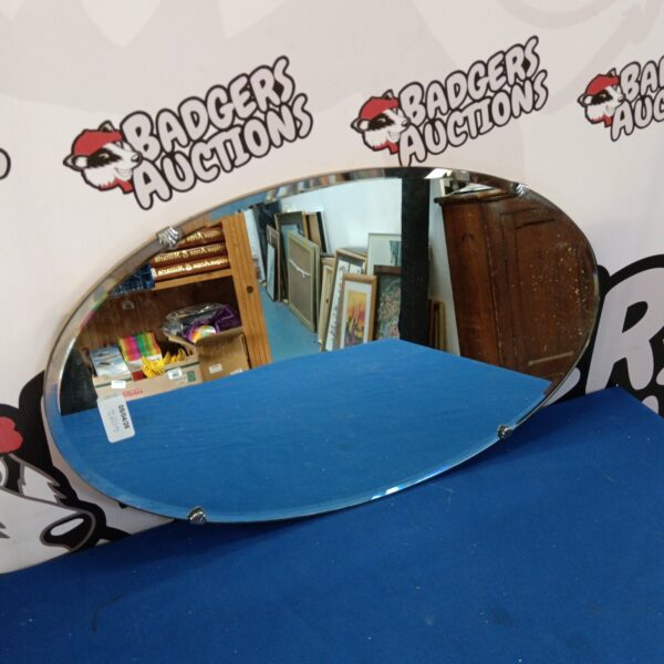 Vintage bevel edge oval mirror for wall decoration.