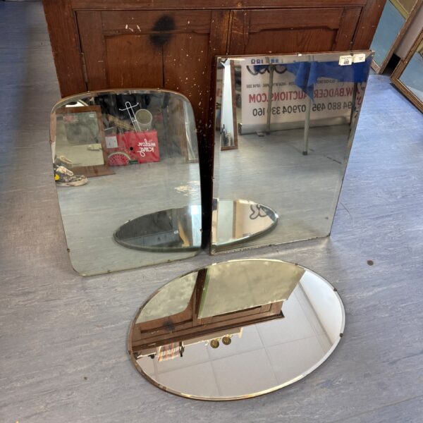 Lot of three vintage bevel glass mirrors with bevelled edges.