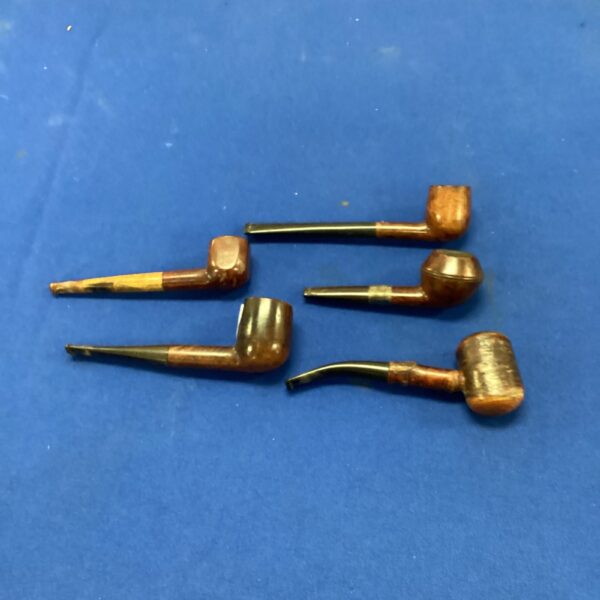 Lot of five vintage briar pipes, including a Dunhill.
