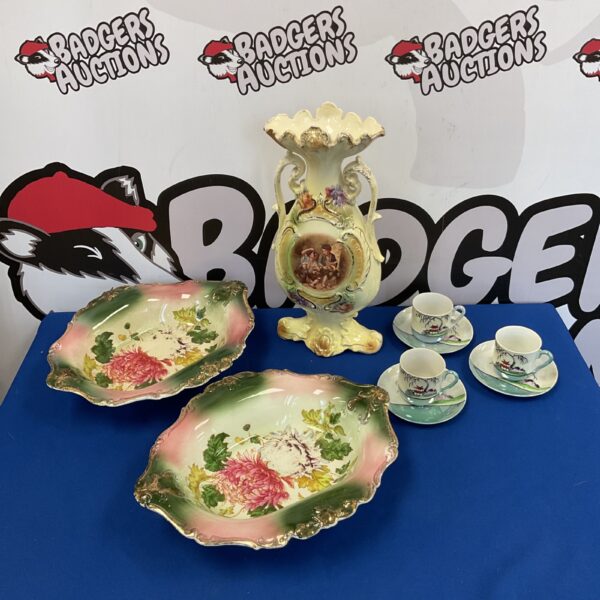 Vintage china collection on a tray, including 1930s transferware dishes.