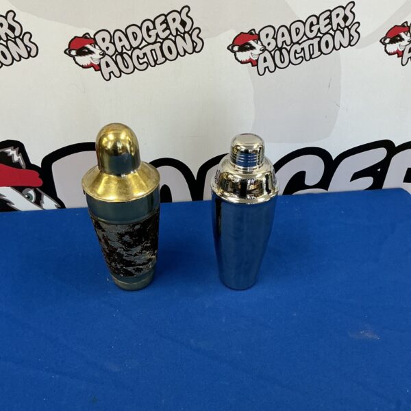 Vintage stainless steel cocktail shaker for home bar use.
