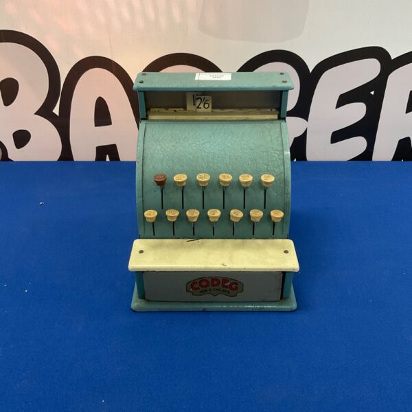 Vintage Codeg metal cash register, a collectible toy.