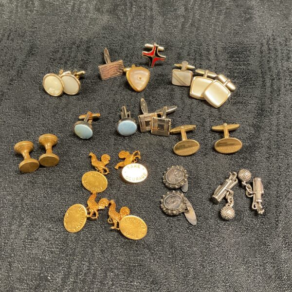 Vintage cufflinks collection, gold tone and novelty designs.
