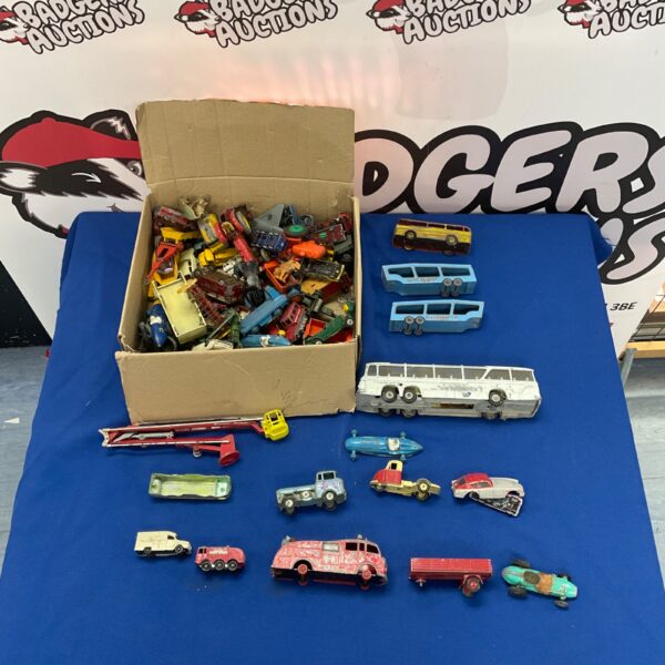 Vintage diecast model cars, buses and trucks in a mixed lot.