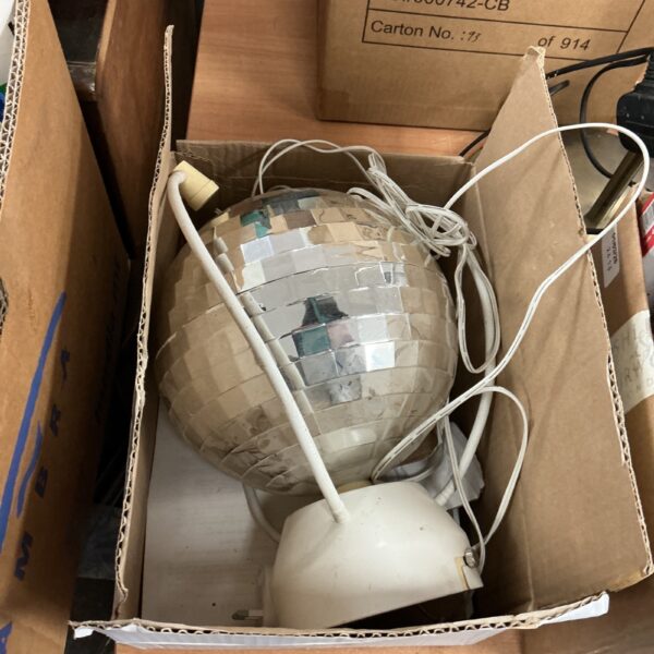 Vintage disco ball light for restoration, showing mirrored tiles.