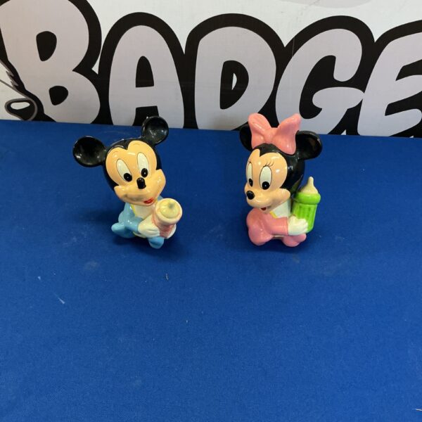 Vintage Disney Mickey and Minnie Mouse figures, collectible Disneyana.