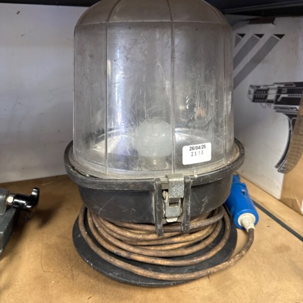 Vintage dome site light with power cord, industrial work light.
