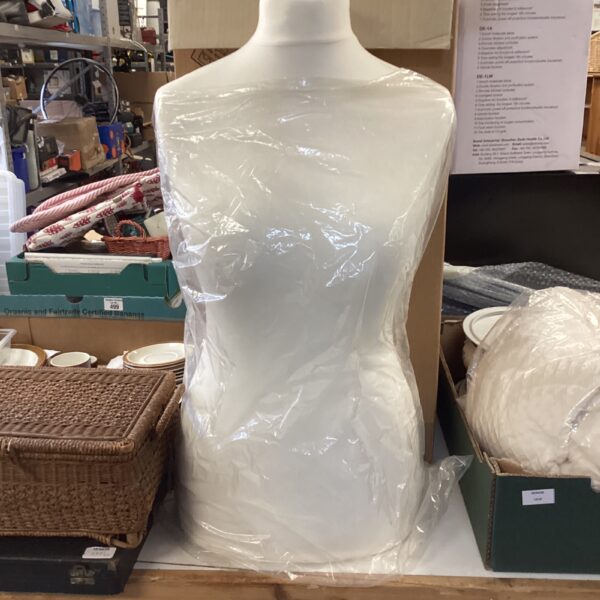 White plastic dressmaker mannequin for fashion design.