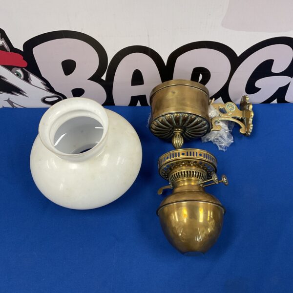 Vintage brass and glass duplex wall lamp for antique lighting.