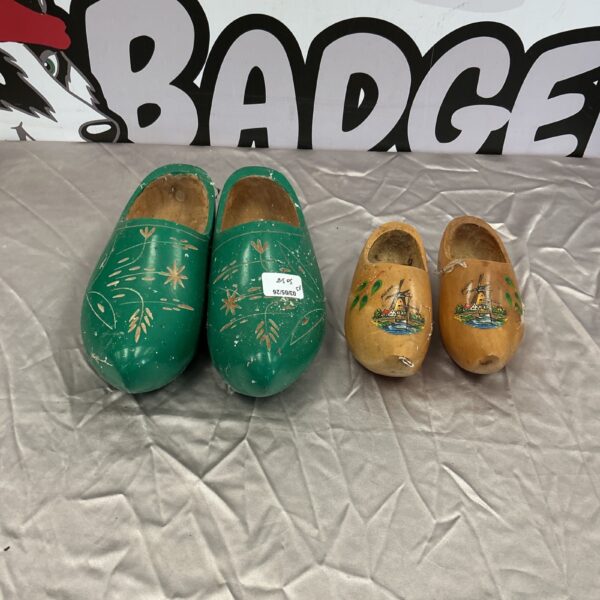 Vintage wooden clogs with colourful floral hand-painted designs.