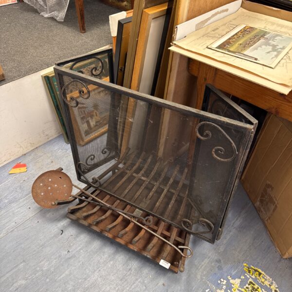 Vintage fire grate with chestnut roaster and wrought iron screen.